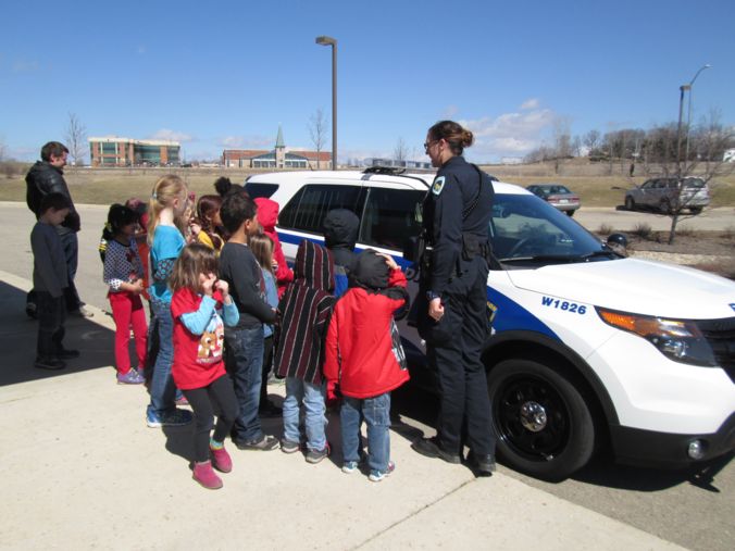 Children check out squad car