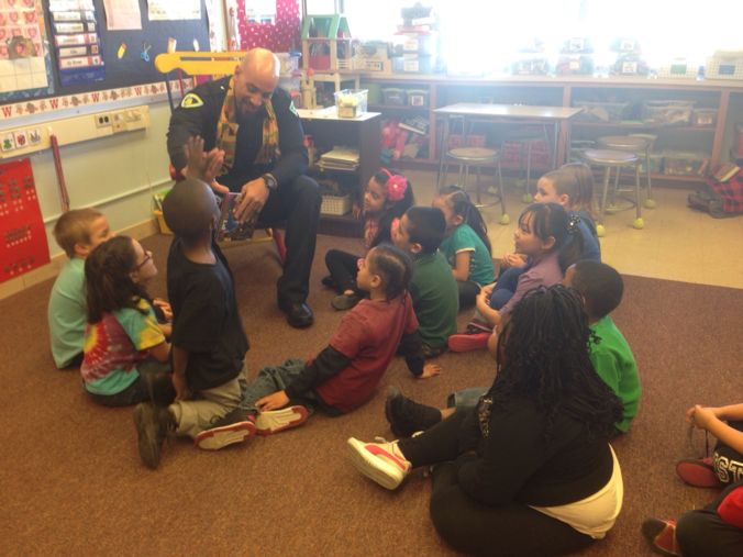 MPD Officer reads to children