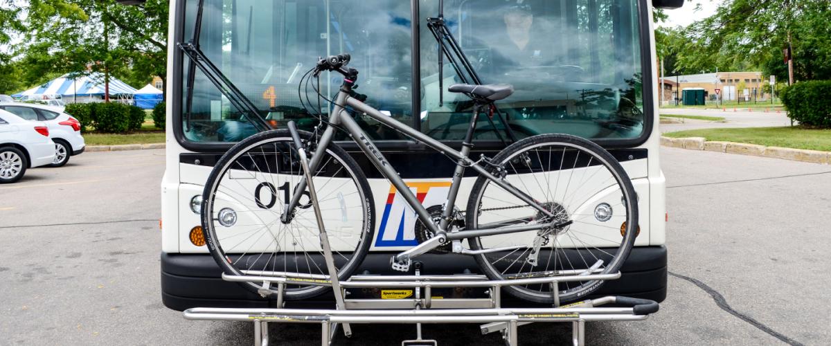 Front of bus with a bicycle on the bike rack