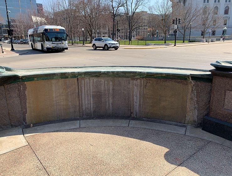 Fountain wall before repair.