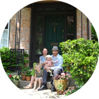 Family in front of their house