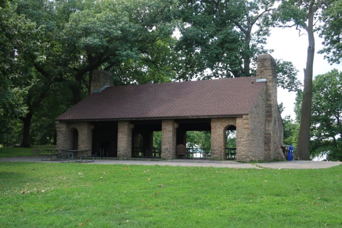 Green grass and park shelter.