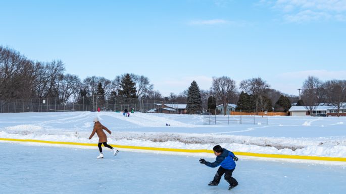 ice rink with skater at heritage heights park
