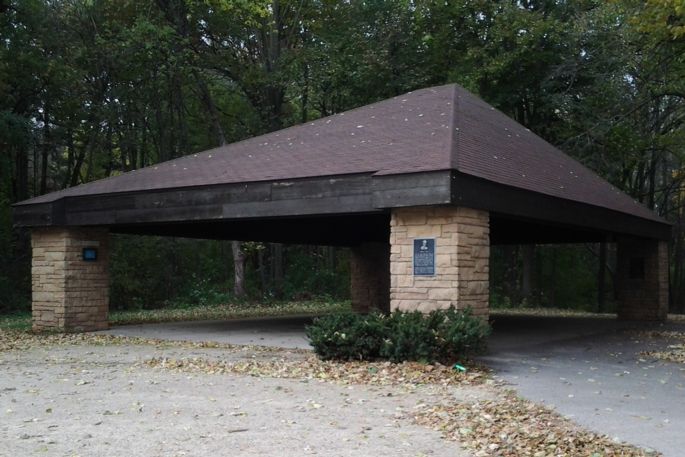 Park shelter in woods.
