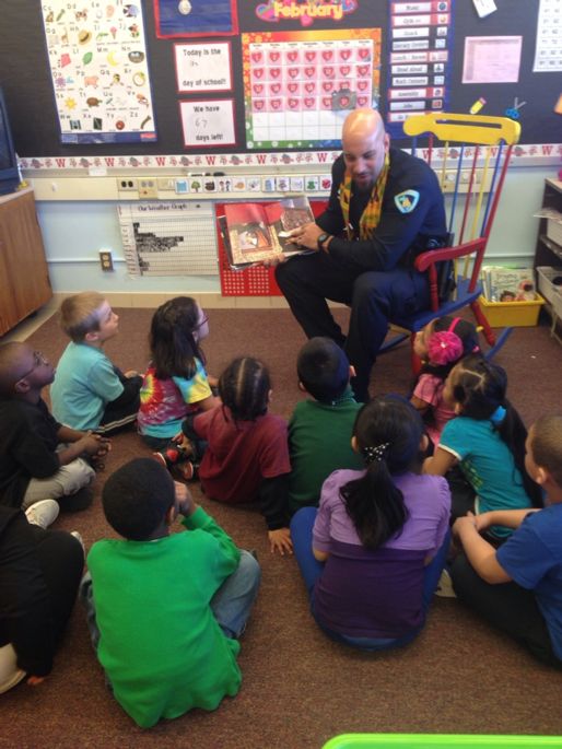 MPD officer reads to children