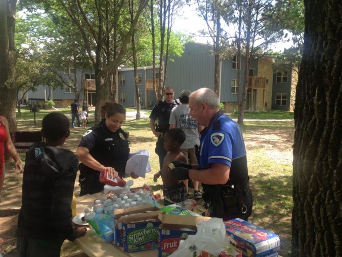 Cops serving hotdogs