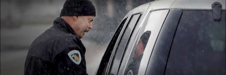 Officer speaking to a vehicle driver