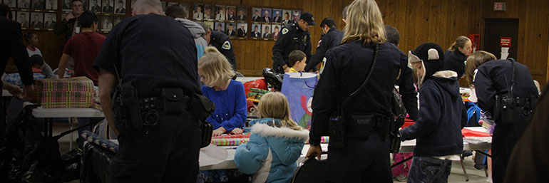 Officers assisting in a community event