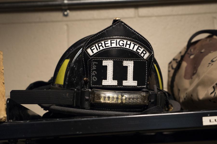 Fire Helmet - Engine Company 11 is comprised of four firefighter/EMTs.