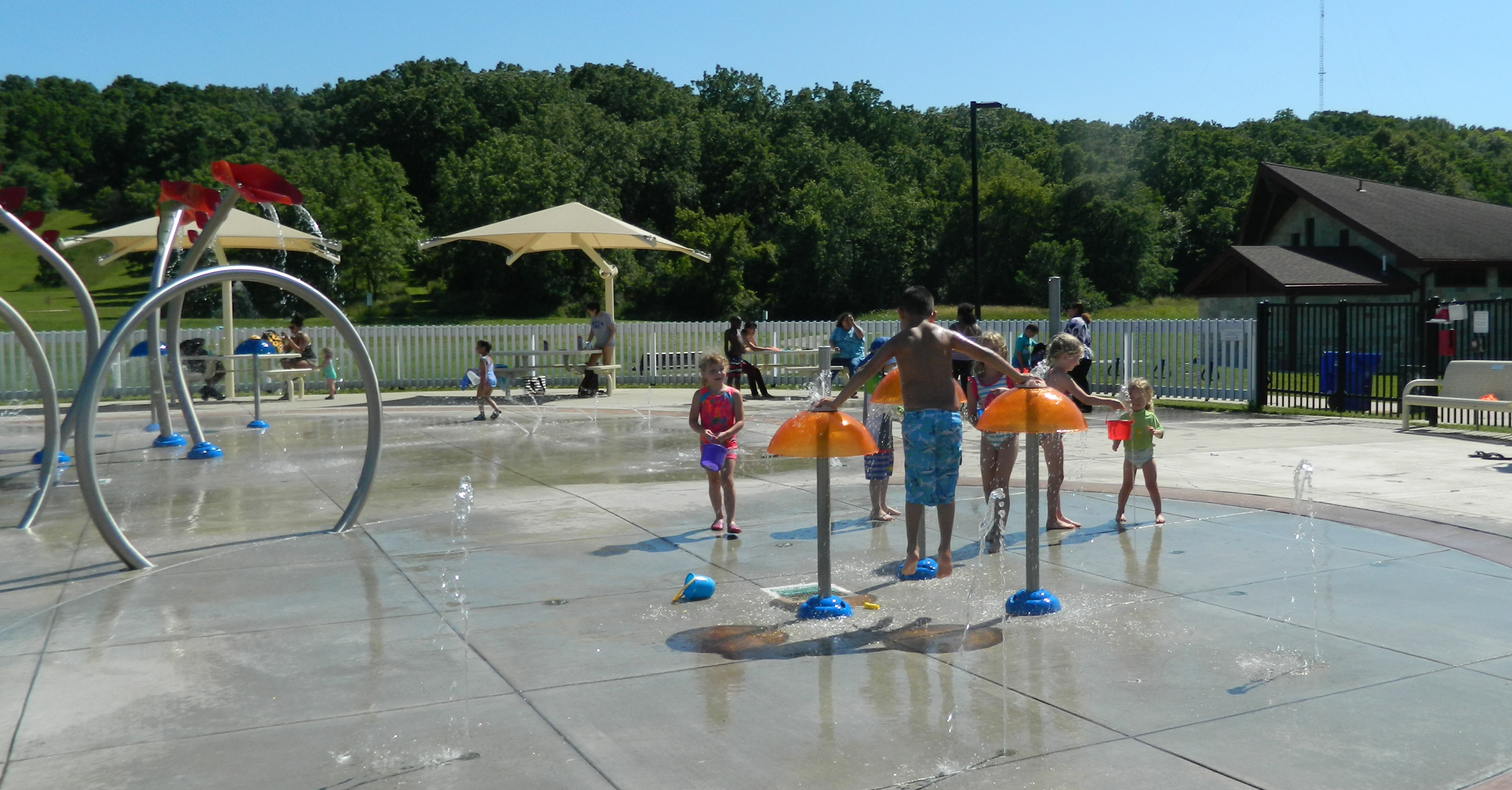 splash park with children playing