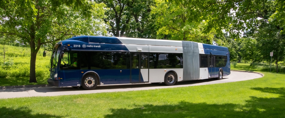 Metro 60-ft articulated bus shown in a park