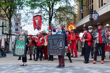 Mayor Satya Rhodes-Conway and Library Director Tana Elias lead the Forward Marching Band in a parade celebrating Madison Public Library's 150th Anniversary in 2025