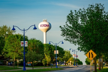 View looking west down Verona Avenue with the Verona Water Tower visible in the background.