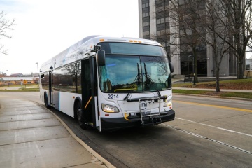Bus with white paint on street