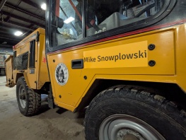 Streets Division municipal tractor 5695 with Mike Snowplowski name badge