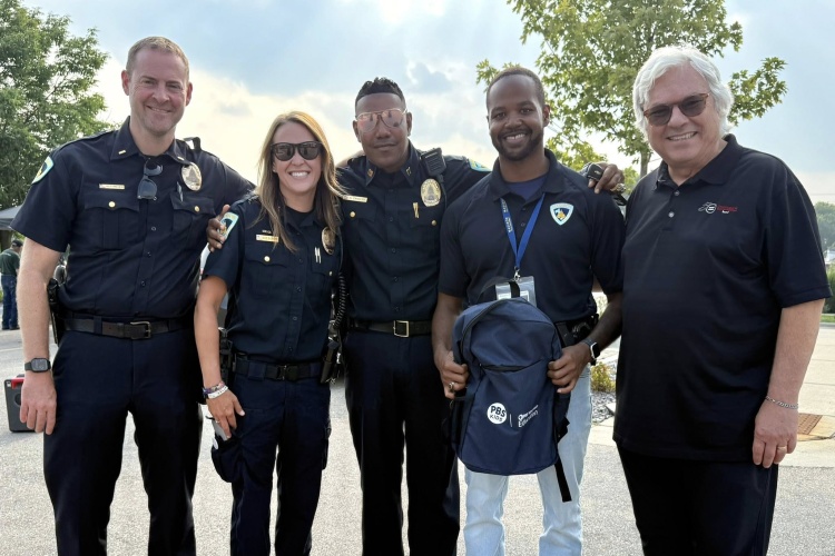 Officers gather on Madison's south side for a National Night Out celebration.