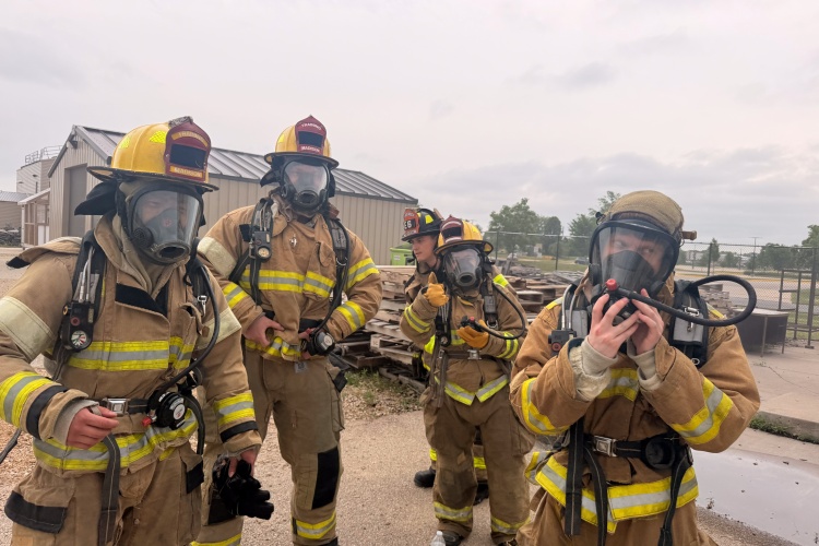 Medical interns put on their breathing masks