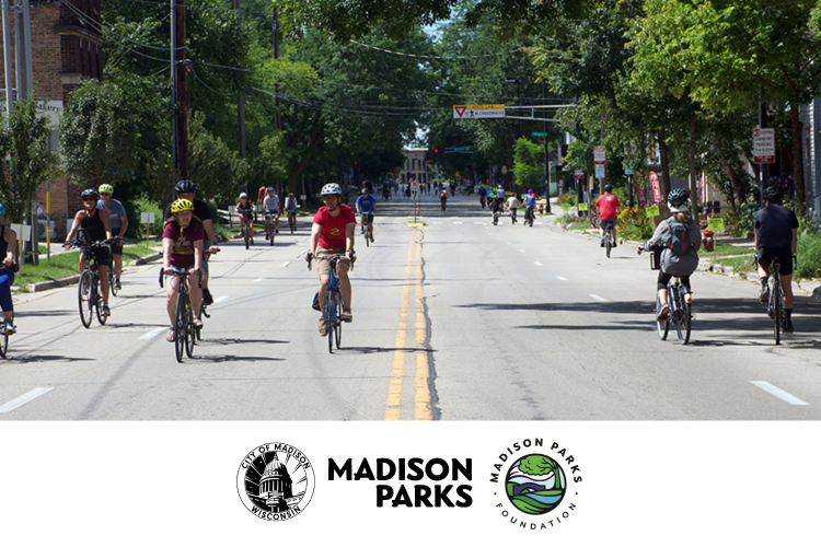 Williamson Street closed to vehicles with bicyclists on the treelined road