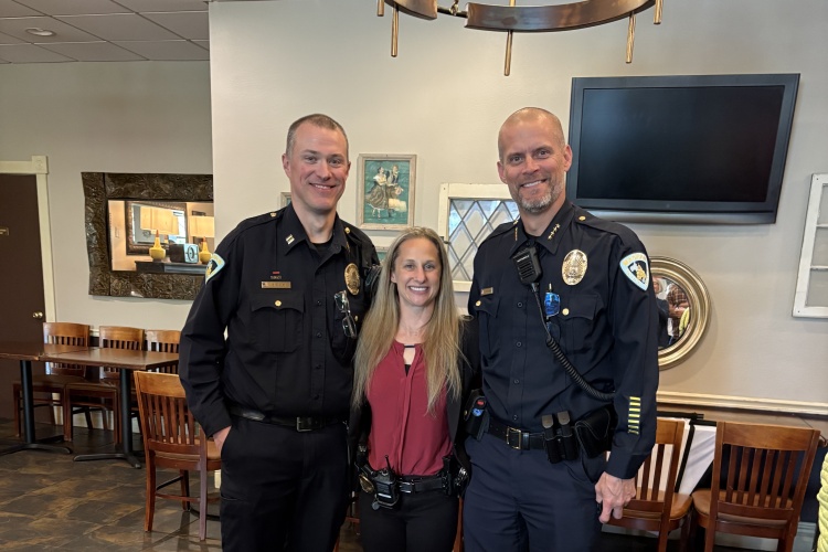 Detective Levett with Captain Nale and Chief Patterson at the Sauk Trails Optimist Club awards banquet where Detective Levett received the Officer of the Year award