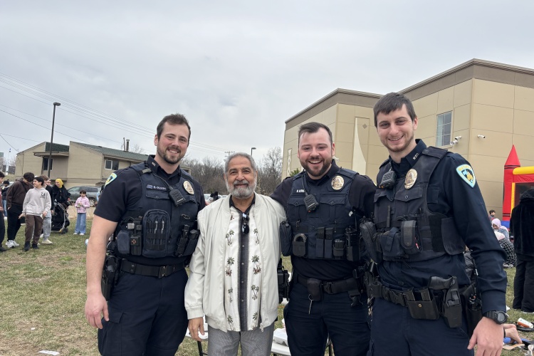 Officers join community members at the Madinah Community Center during a Muslim community event