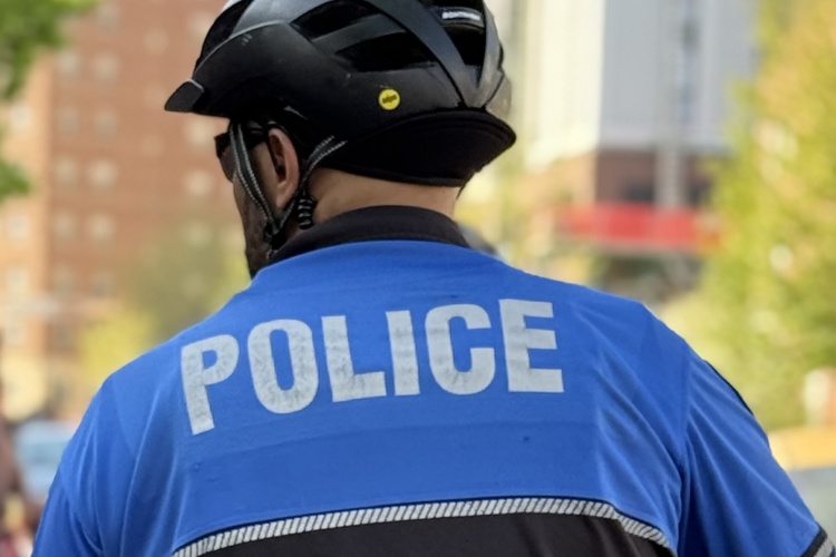 Portrait of a Madison Police Department officer on bike patrol in our community