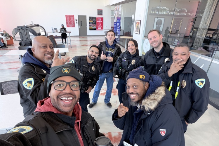 Portrait of South District officers at a Coffee with a Cop event