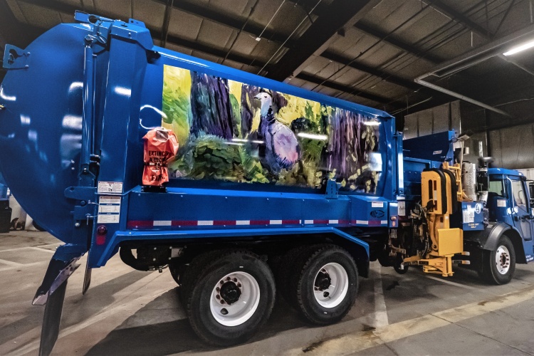 Alternate view of the truck with the turkey mural. Also visible is the pneumatic hand that grabs collection carts