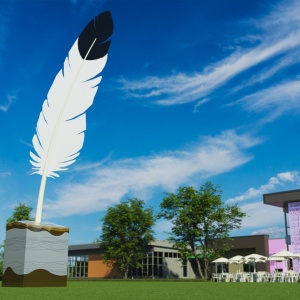 Open larger image in modal - A sculpture depicting a white feather with a black tip, on top of a square base.