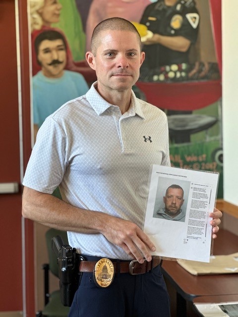 Detective Sergeant Mark Hull receives the National Crime Agency Award for his role in an international investigation that led to the conviction of a dangerous online predator.