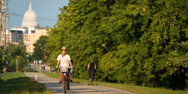 Biking to work with Wisconsin State capital in backbground