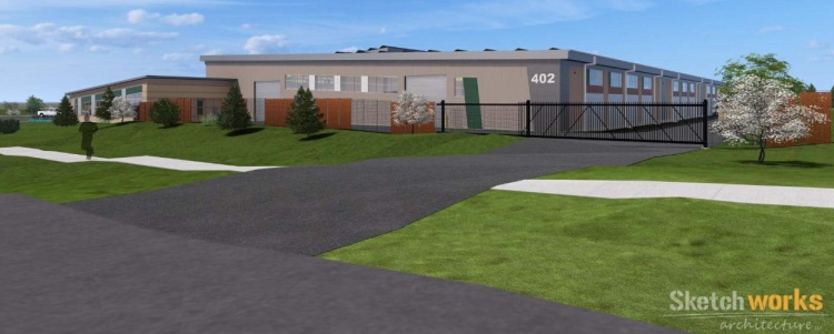 A rendering showing one side of a gray and tan building.  The driveway entrance has a fence and gate.