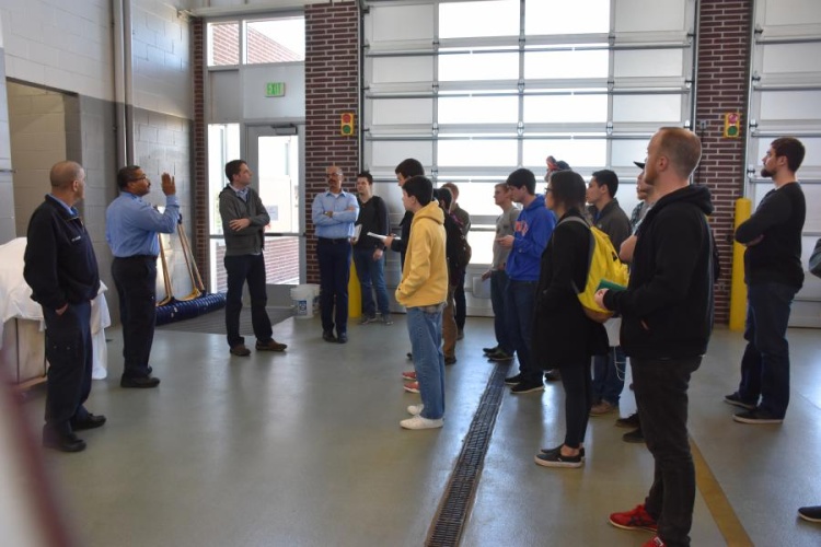 Students inside the apparatus bay