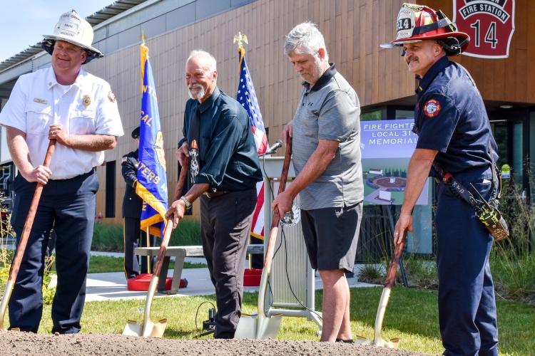 Four representatives break ground on the firefighters' memorial