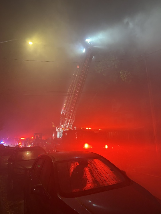 Ladder 1's aerial ladder is extended for water tower operations