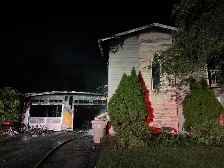 building with garage totaled by fire damage