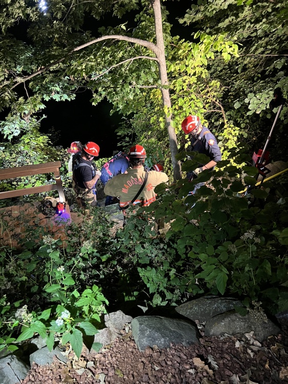 Rescuers secure the patient for transport