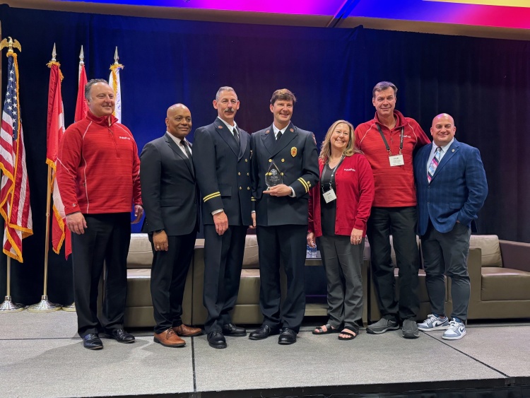 Madison Fire is presented with the Heart Safe Community Award at the IAFC Conference
