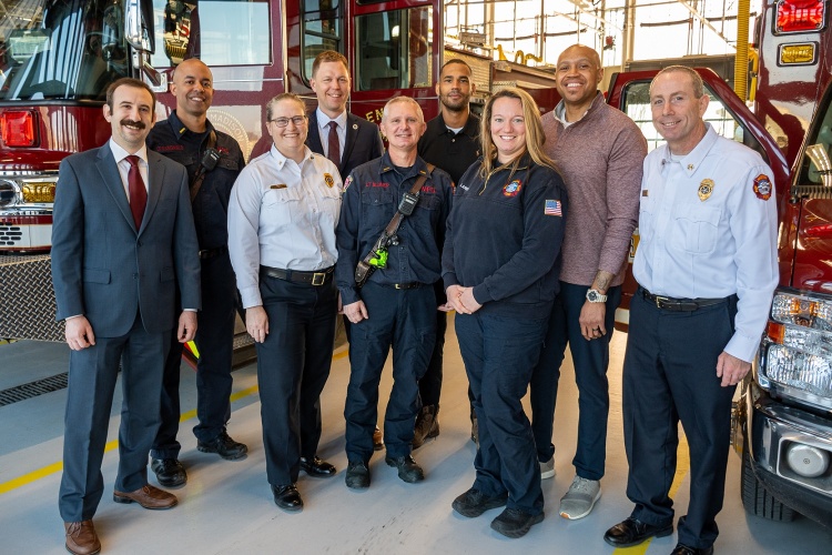 Dr. Michael Spigner, Fire Chief Chris Carbon, and members of the Madison Fire Department