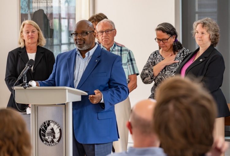 Dr. Reuben Anthony speaking at a press conference