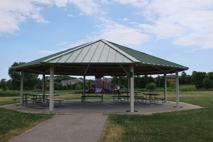 blackhawk park gazebo with picnic tables and nearby playground
