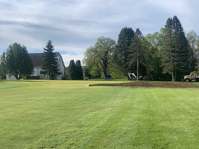 A New mound feature under construction on hole #11 at yahara hills golf course.