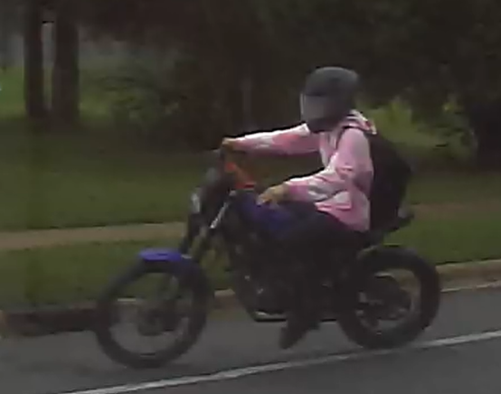 A driver on a motorcycle flees from police on a road in Madison.