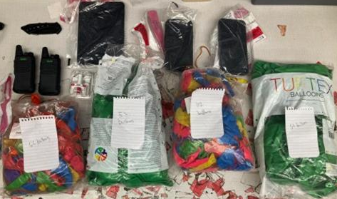 Balloons confiscated after multiple people were arrested for distributing nitrous oxide.