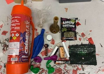 Canister, balloons confiscated after multiple people were arrested for distributing nitrous oxide.