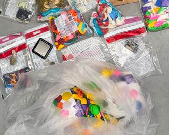 Balloons confiscated after multiple people were arrested for distributing nitrous oxide.