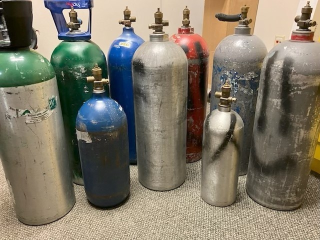 Tanks confiscated after multiple people were arrested for distributing nitrous oxide.