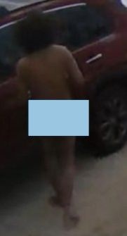 Naked suspect attempts to break into vehicle.