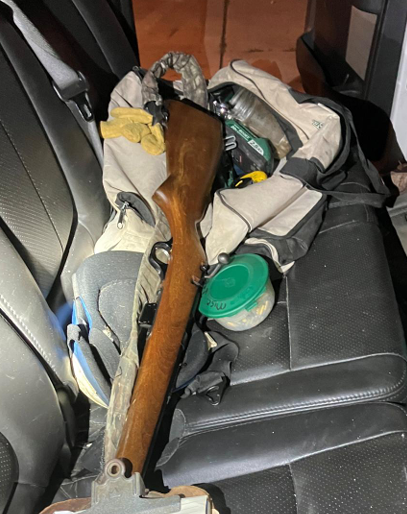 Firearm found in plain sight of vehicle during road rage incident.