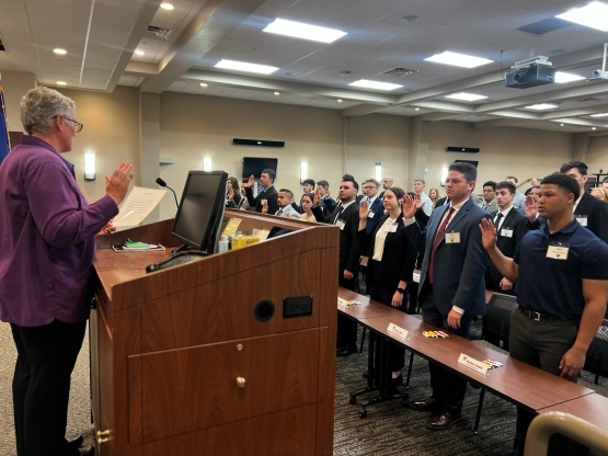 The 71st Academy class of the Madison Police Department takes the oath of office.