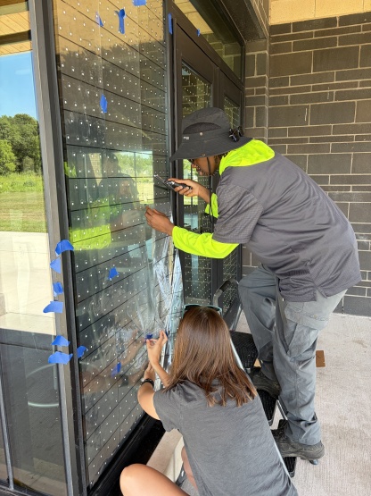 installing bird collision prevention window dots